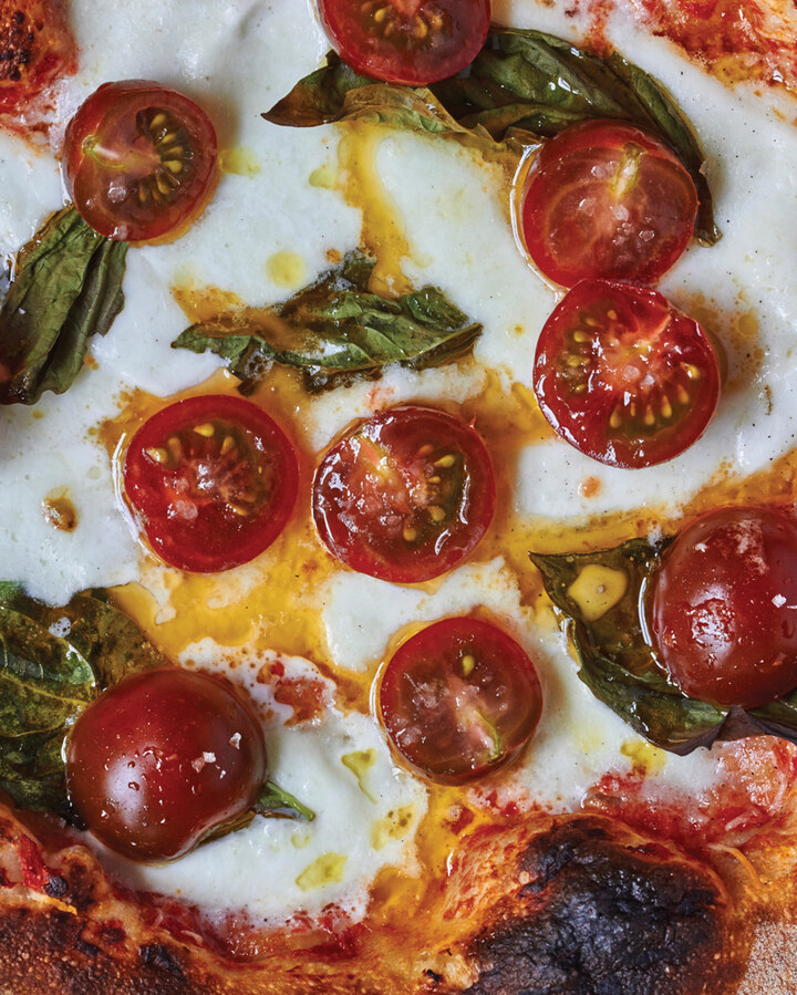 Margherita “Extra” with cherry tomatoes.
